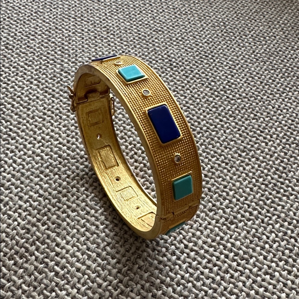 Freida Rothman Gold Bracelet with turquoise and blue accents.Original price 565$